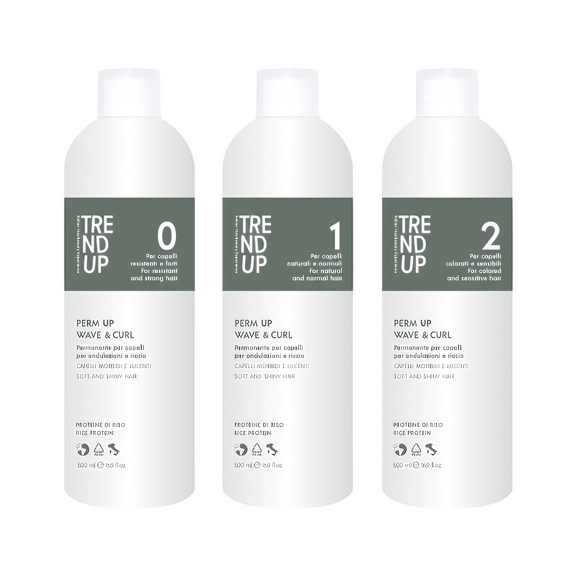 Three bottles of Edelstein Perm UP hair perming lotion, with indicators for different hair types or conditions, positioned side by side.