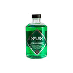 A bottle of Xflex After Shave Freshman with a green label, indicating it is a professional aftershave lotion.