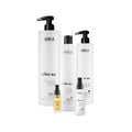 A set of Nika Fairy Silk hair care products including a shampoo, conditioner, treatment, shine serum, and leave-in cream, all in white packaging with black and silver accents.
