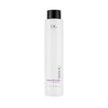 A tall white bottle of Timeless Blend Anti-Age Shampoo with a black cap and purple label, displaying the brand name and product name.
