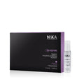 A boxed Nika Radiance Treatment product with a single vial visible, predominantly black packaging with purple accents and white text.