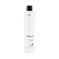A bottle of Moisture Lock Smoothing Shampoo with a white label and black cap, branded by Nika.