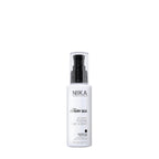 A white spray bottle with a black pump labeled Nika Fairy Silk extender, designed for hair care.