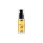 A bottle of NIKA Fairy Silk Shimmer Smoothing Serum with a yellow label, designed for smoothing and protecting hair.