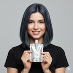 Woman holding a code zero gem collection iron 18 silver hair color mask  pouch with a gray background