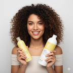 Woman holding two bottles of edelstein curly up shampoo products against a plain background