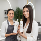 Two women holding hair care products in a salon setting